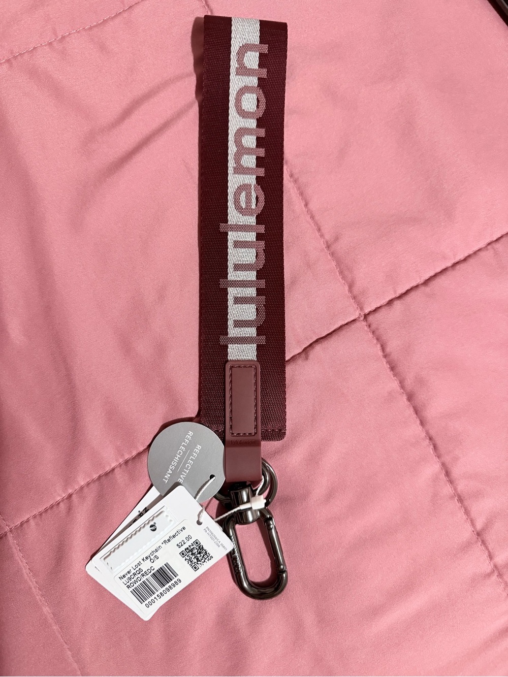 Lululemon Never Lost Keychain in Burgundy color